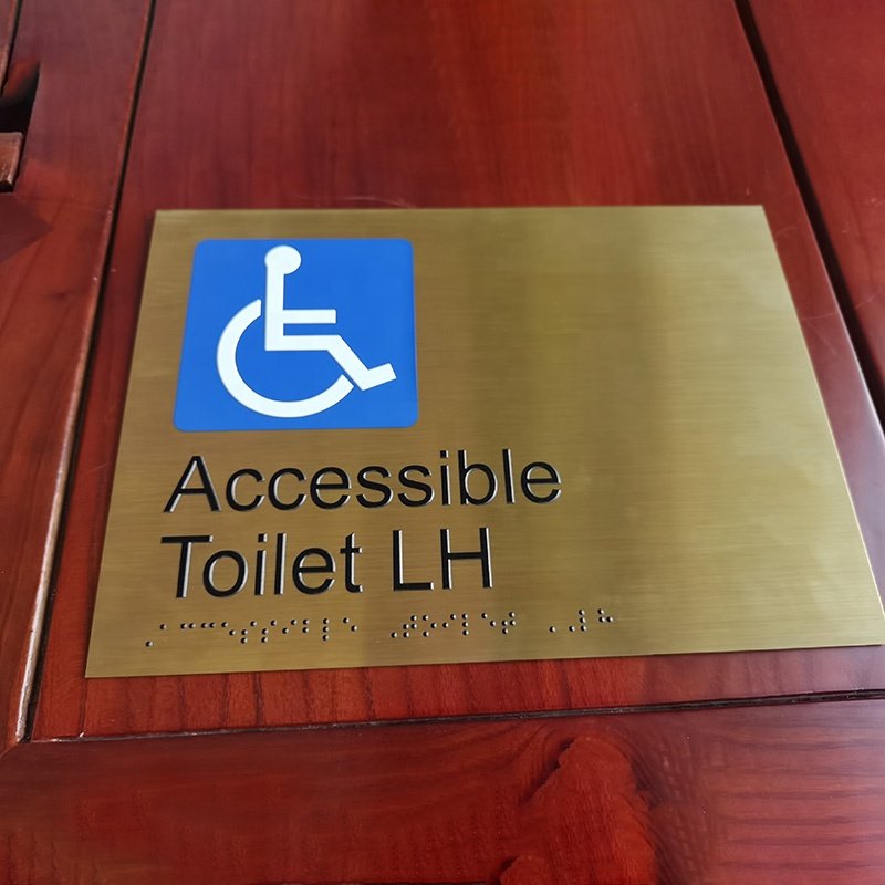 braille restroom sign